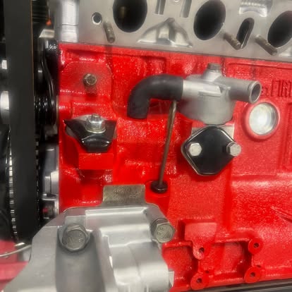 Powder-coated red engine block